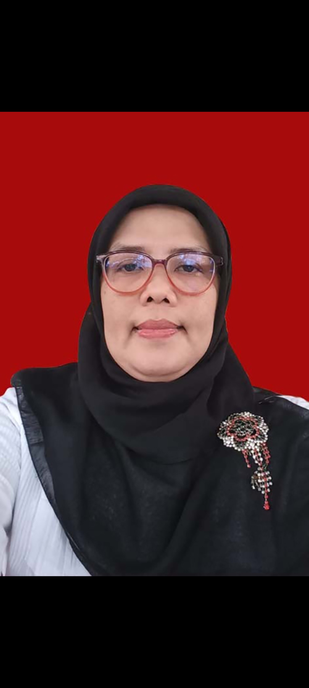 Dr. Erba Rozalina Yulianti M.Ag.