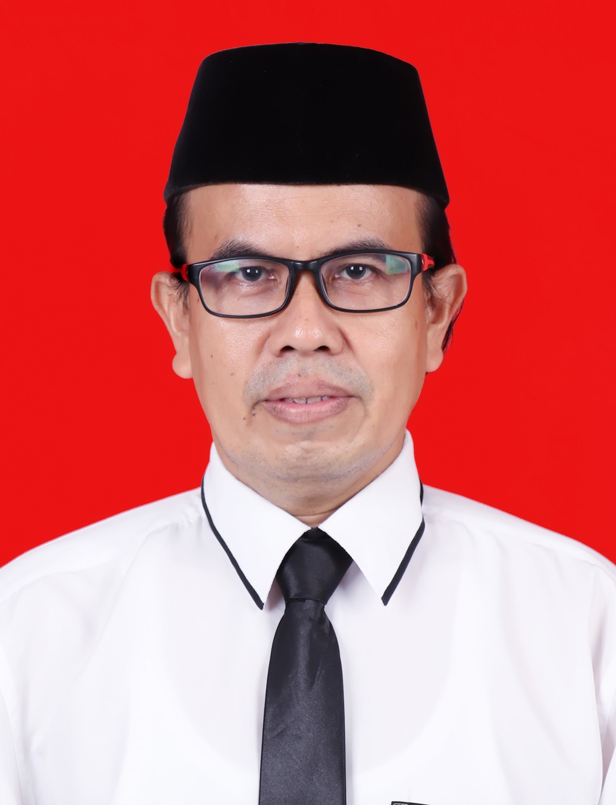 Hamdani M.Ag., Ph.D.